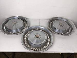 lot 112 image: Set of (3) 16-Inch Cadillac Wheel Center Hubcaps, Silver