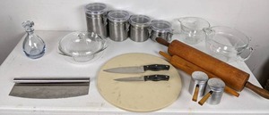 lot 118 image: Kitchen Essentials Decanter, Pyrex Bowl, Rocking Pizza Cutter, Baking Stone, Chicago Cutlery Knives, & More
