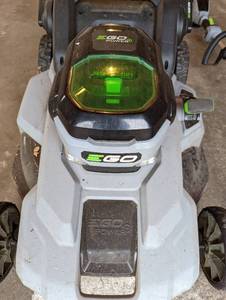 lot 93 image: EGO Electric Lawnmower, Weed Whip and Chainsaw