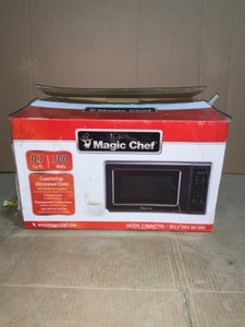 Magic Chef 0.7 cu. ft. Countertop Microwave in Black with Gray Cavity. See Pictures