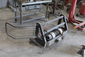 lot 623 image: Ford F350 Truck Front Bumper Rack with Ramsey RE 12000 Winch