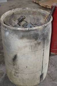 lot 747 image: Plastic Drum with Scrap Metal