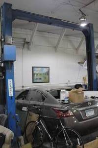 lot 603 image: Benwil Outrigger TPO-7 9000-lb 2-Post Lift