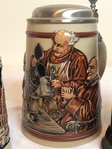 lot 78 image: Three Vintage German Beer Steins