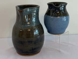 lot 47 image: Two Decorative Pottery Pitchers