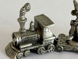lot 197 image: Four Piece Disney Express Miniature Pewter Train