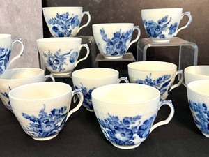 lot 70 image: 15 Royal Copenhagen Blue Flower Teacups and Pair of Candlesticks