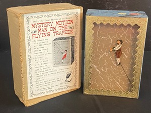 lot 176 image: Replica of Vintage Hackman Mystery Motion Man on Flying Trapeze
