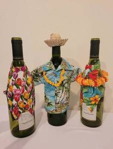 lot 131 image: Set of 9 Dressed Wine Bottles