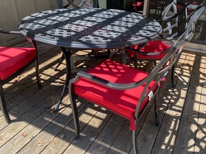 lot 211 image: Round Metal Patio Table and Four Chairs