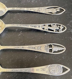 lot 268 image: Four Sterling Silver State Souvenir Spoons including Sterling New York Souvenir Spoon