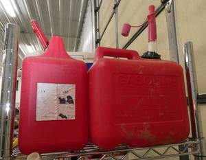 4 small gas cans 1-2 gallon