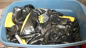 Large tote with a Lot of 3 used inflatable bunkers 4 ft tall with pump