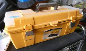 Plastic toolbox full of plumbing tools