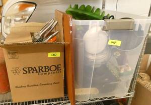 A tote and a box full of kitchen items