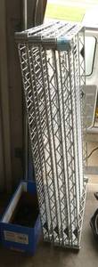 Metro shelf with 4 shelves, 36 wide, 2 poles are about 5 ft tall and the other 2 are about 7 ft