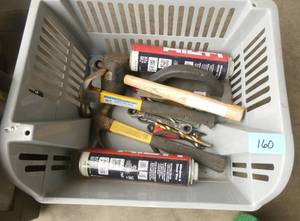 Basket of tools, hammers, window and door seal