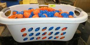 Laundry tub full of plastic eggs for prizes, games, egg hunts