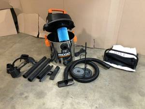 lot 3 image: RIDGID 16 Gal. 6.5-Peak HP Stainless Steel WetDry Shop Vac with Fine Dust Filter, 7 ft. Hose, 10 ft. Pro Hose and Accessories - New Condition - Review all pictures