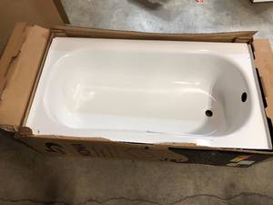 lot 26 image: Bootz Industries Kona 54 in. Left Drain Rectangular Alcove Soaking Bathtub in White - Has Damage on the corner - Review all pictures