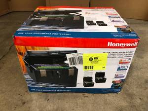lot 38 image: Honeywell 1.06 cu. ft. Molded Fire Resistant and Waterproof Legal Document Storage Chest with Key and Double Latch Lock - Good Condition - Review all pictures
