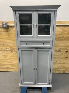 lot 14 image: HOME DECORATORS COLLECTION Hampton Harbor 25 in. W 4-Door Tall Cabinet in Dove Grey