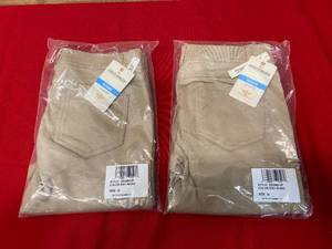 lot 59 image: DOCKERS Lot of 2 Pairs of- Girls Jeggings in Khaki (Size 12 Regular)