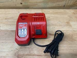 lot 63 image: MILWAUKEE M12 and M18 12-Volt18-Volt Lithium-Ion Multi-Voltage Rapid Battery Charger