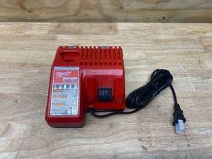 lot 64 image: MILWAUKEE 48-59-1812 M12 or M18 18V and 12V Multi Voltage Lithium Ion Battery Charger w Onboard Fuel Gauge