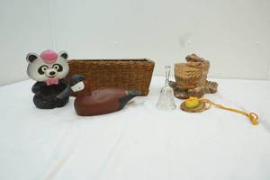 stone frog planter and wood duck