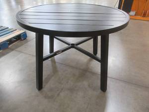 lot 130 image: Hampton Bay High Garden Black Steel Slat Top Round Outdoor Patio Dining Table, GL-18043-B. Slight Ding (See Photo).
