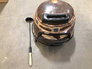 lot 16 image: 22 in. Talavera Tile Ocre Round Smooth Wood Burning Outdoor Pizza Oven in Brown - Good Condition - Review all pictures