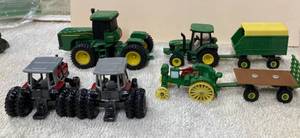 Seven Ertl 164th Scale Farm Toys and One Ertl 143rd Scale NIB Farm Classics Flare Box Wagon