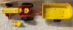 Plastic Tractor and 2-Wheel Stake Bed Trailer with Driver - Missing Front Wheel, and Seven Plastic Seated Toy DriverOperators