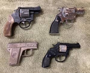 Four Vintage Cap Guns Including a Bond XX Snub Nosed Revolver, A Dick Cap Gun with Eagle Image on Hand Grip Plus 2 Others