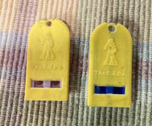 Two Cracker Jack Plastic Whistles, a Metal Baby Book Made in Japan, 6-Cracker Jack GO Fish Cards and More