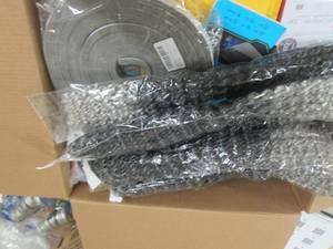 box of hair extensions, masks, conv...