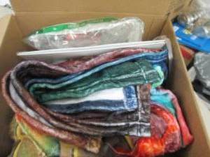 box of water gun toys, blanket , ch...