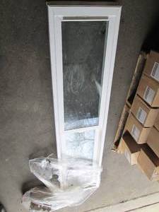 New uninstalled window 73 inch tall x 18 inches wid...