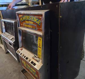 lot 220 image: Box with Authentic Slot Machine Fronts