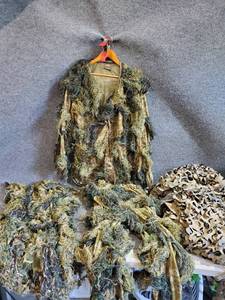 lot 215 image: Camo Netting and Gilley Suit