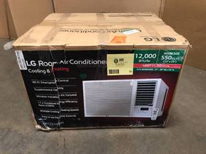 LG Room Air Conditioner 12,000 BTU hr 550 sq ft. - In Working Condition - Review all pictures