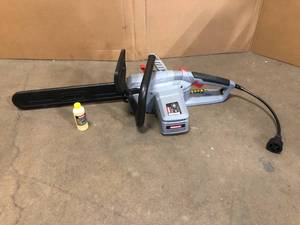 Oregon CS1500 Self-Sharpening 15 Amp Corded Electric Chainsaw, 18 in. Bar, Equipped with PowerSharp Saw Chain - Good Condition - Review all pictures