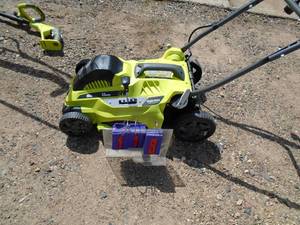 Ryobi 16 110 volt push mower. Nice shape. Tested & works. As shown.