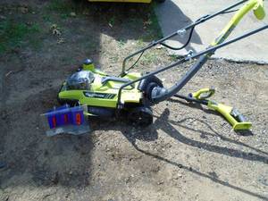 Ryobi 13 18 volt mowertrimmeredger. No battery or charger. Tested & works. As shown.