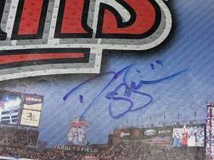 lot 5 image: 2013 Minnesota Twins Autographed Yearbook Morneau, Escobar, Plouffe, Dozier, and many more