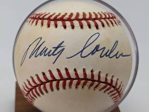 lot 22 image: Marty Cordova Hand-Signed Baseball with Display