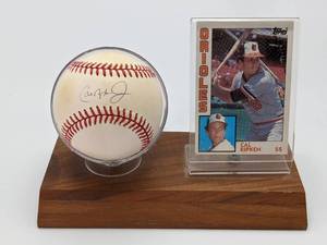 lot 40 image: Cal Ripken Jr Hand-Signed Baseball and 1984 Baseball Card with Display