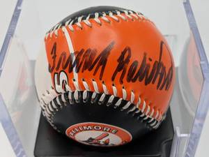 lot 44 image: Frank Robinson Hand-Signed Artistic Baltimore Orioles Baseball with Display PSADNA Certified