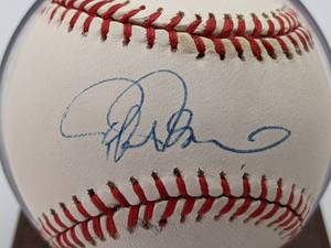 lot 50 image: Rafael Palmeiro Hand-Signed Baseball with Display PSADNA Certified